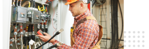 electrician working on a panel